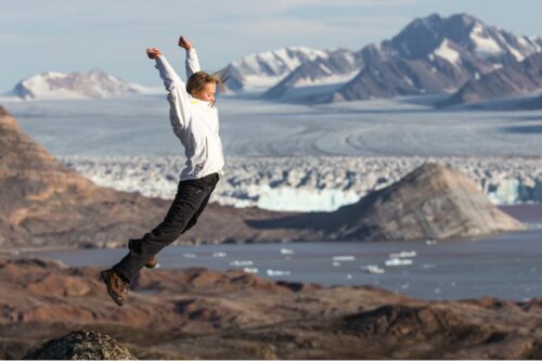 Are Arctic Expeditions Family-Friendly - An Honest Guide to Taking Kids to the Poles - Child Jumping
